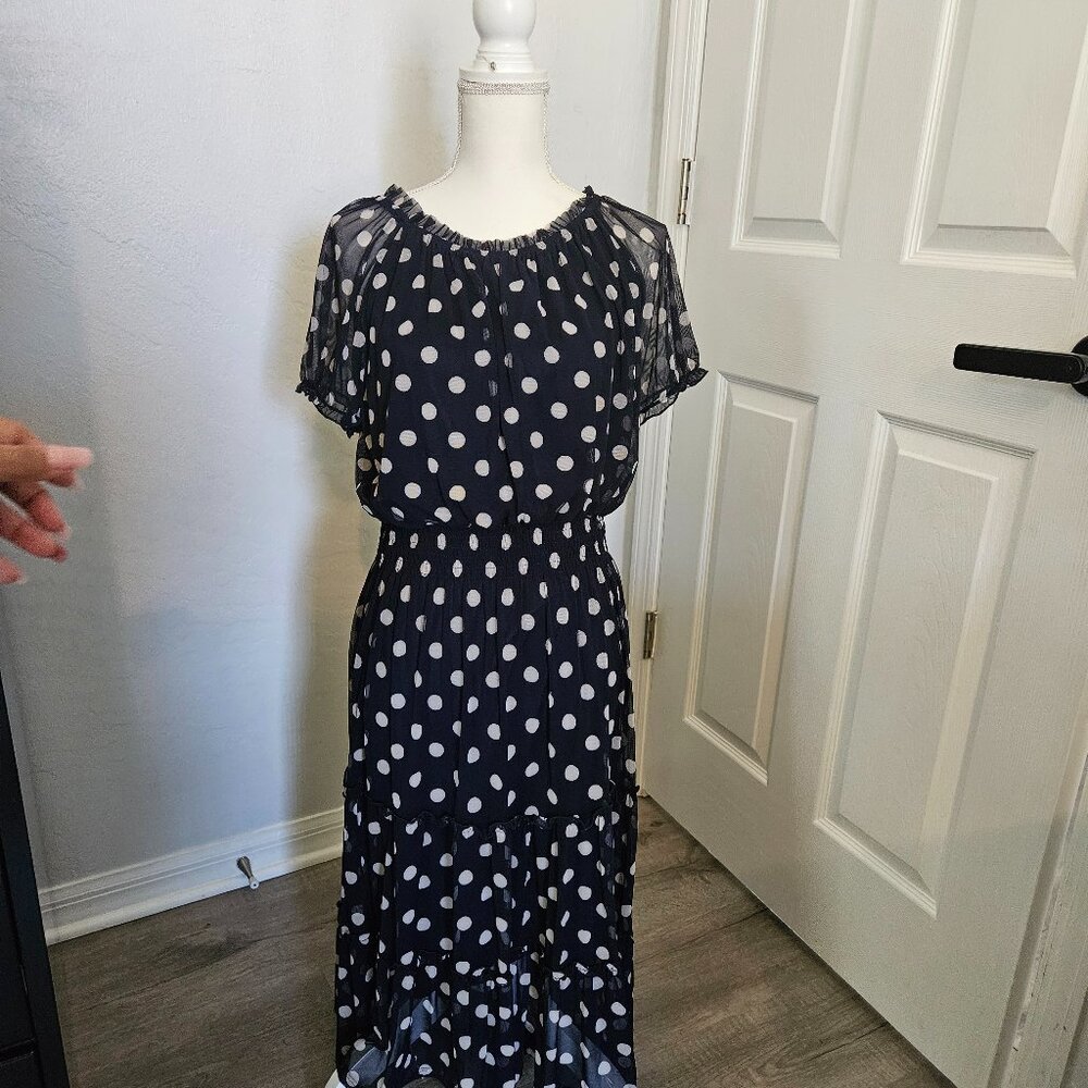 This Kate and Lily dress is a stunning Dark blue Polka dot